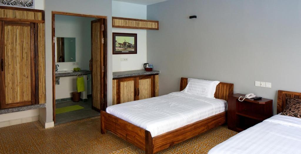 The Sangkum Hotel พนมเปญ ห้อง รูปภาพ